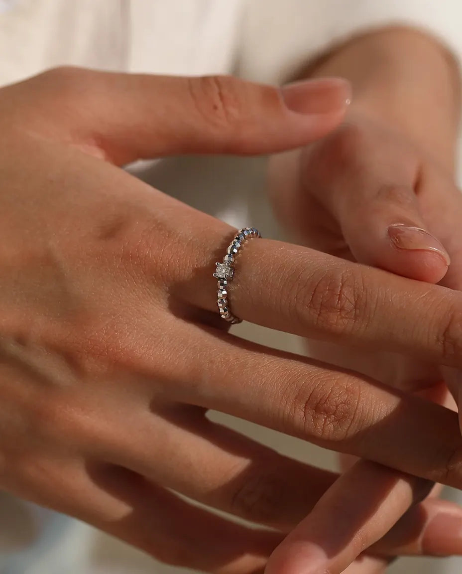 Teardrop moissanite ring on adjustable beaded sterling silver band