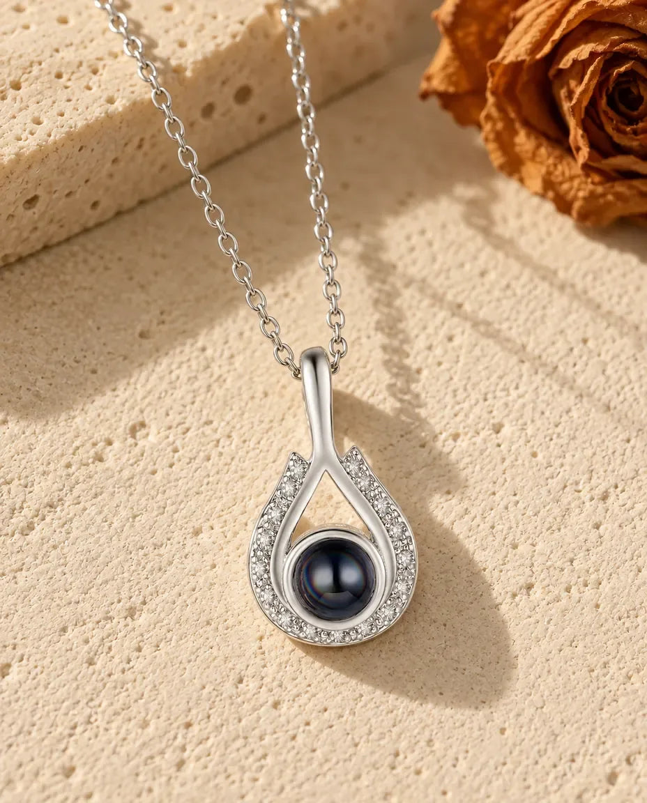 Personalized Teardrop Photo Projection Necklace in Silver - front view in silver