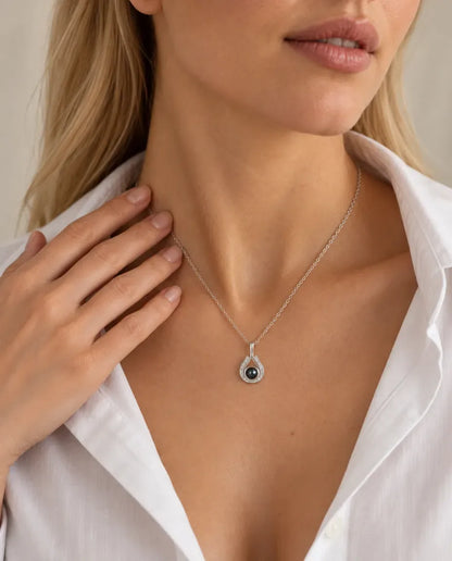 Personalized Teardrop Photo Projection Necklace in Silver - worn on a model