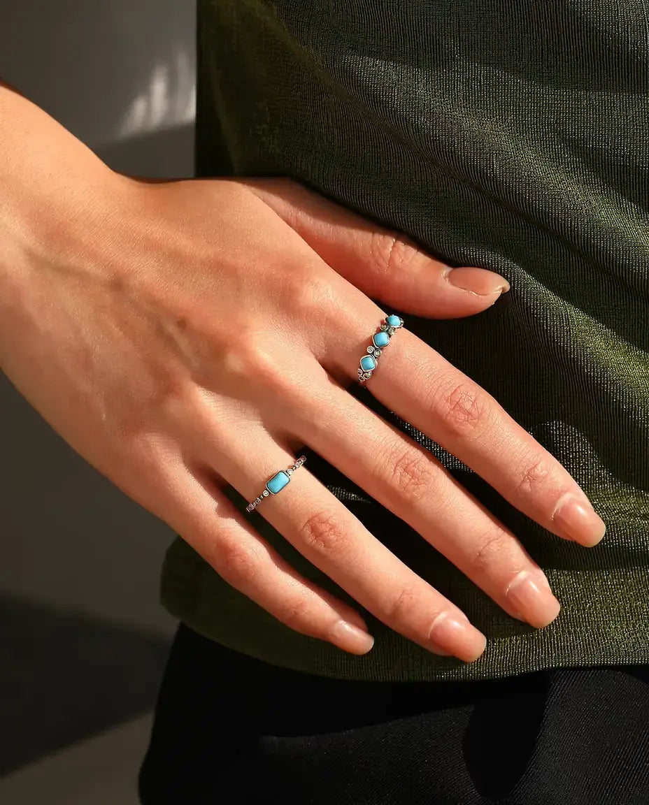 Turquoise cabochon ring on beaded bezel band in 925 sterling silver