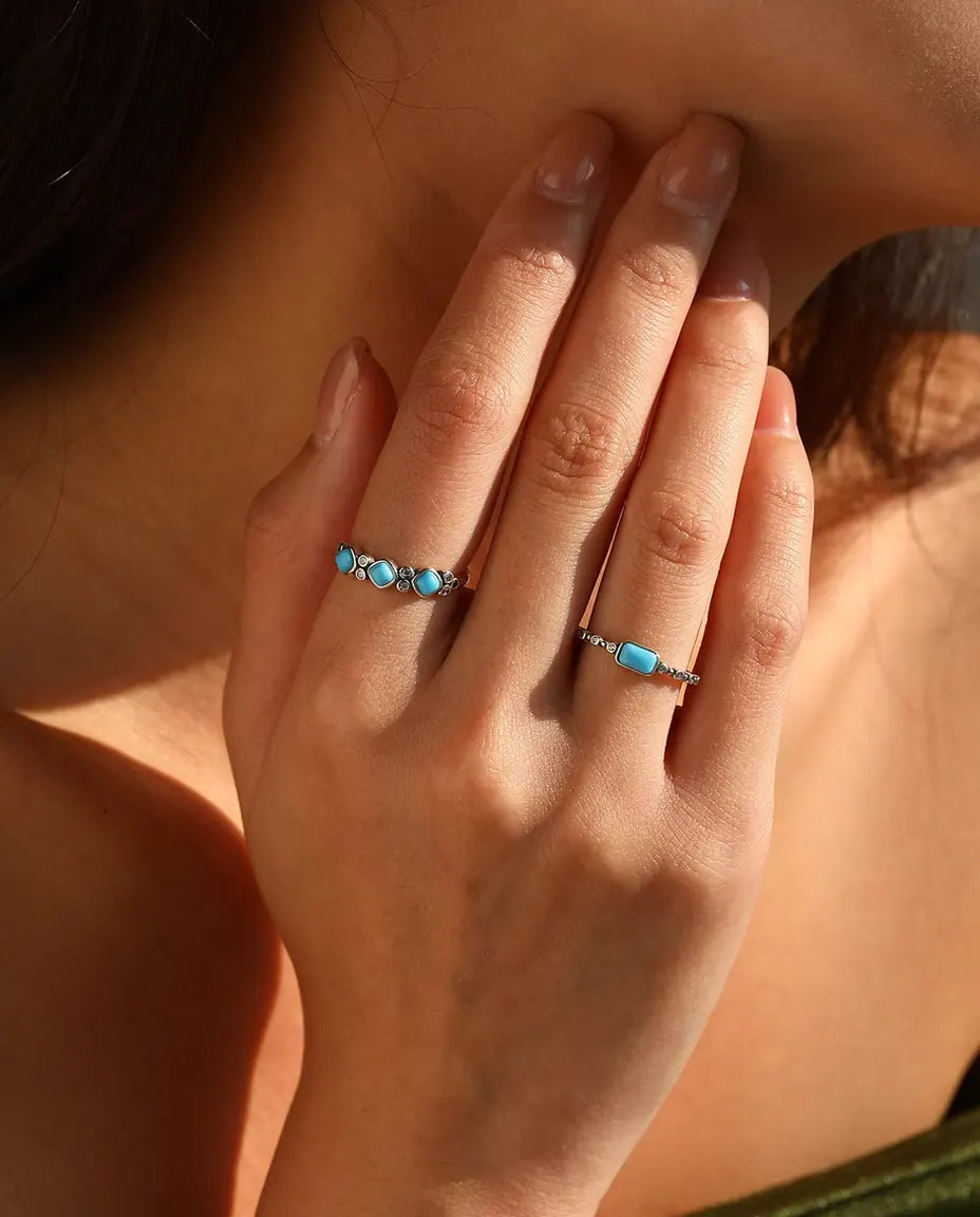 Turquoise cabochon ring on beaded bezel band in 925 sterling silver