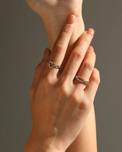 Two tone chain link ring in 925 sterling silver with a gold tone pave bar