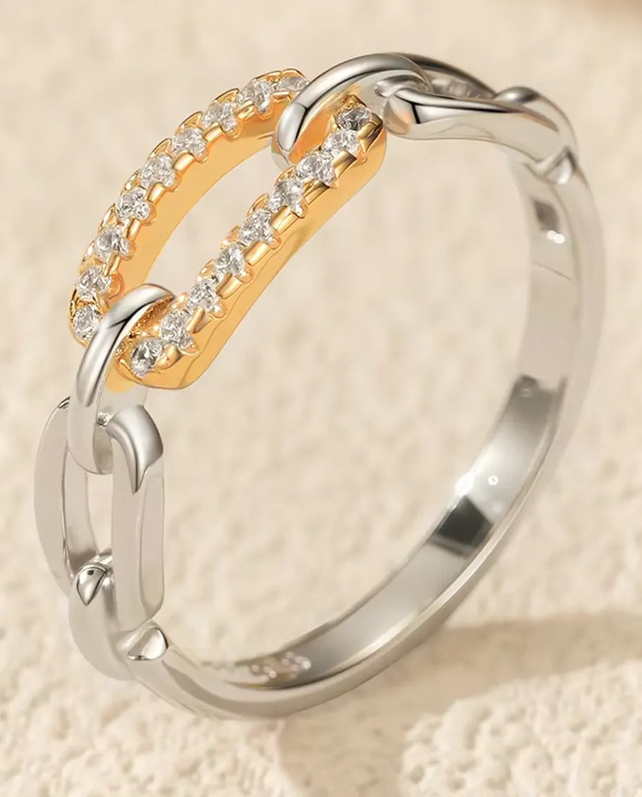 Two tone chain link ring in 925 sterling silver with a gold tone pave bar