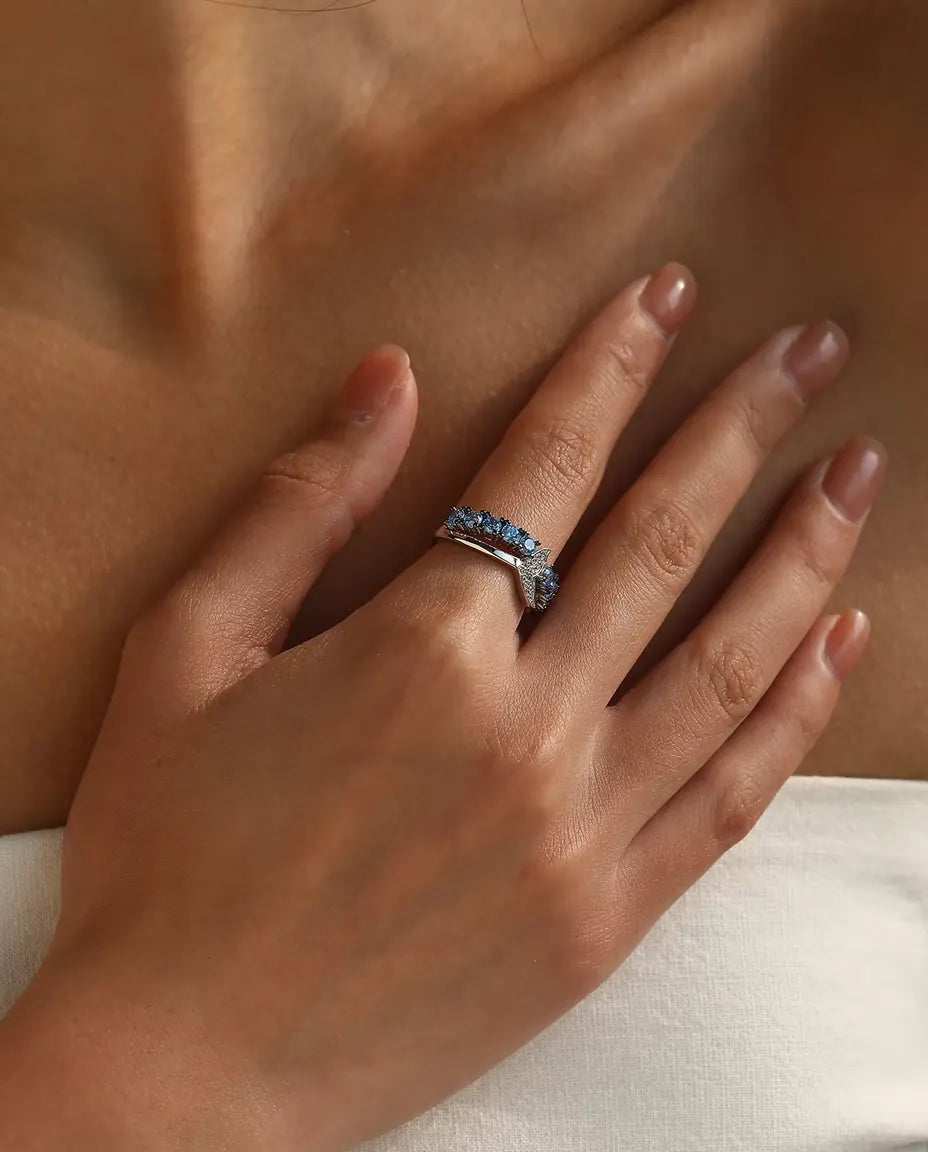 Whale tail ring with blue and white zirconia in 925 sterling silver