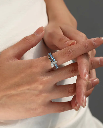 Whale tail ring with blue and white zirconia in 925 sterling silver