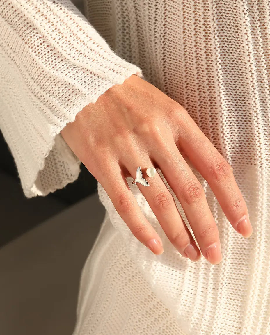 Whale tail open ring in 925 sterling silver with a pearl white bead